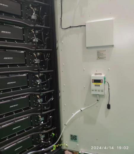 Gongchuang cabinet dehumidifier mounted in the lower part of an enclosure with the drain hose routed downward