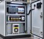 Electrical cabinet dehumidifier installed in the lower half of an industrial control cabinet
